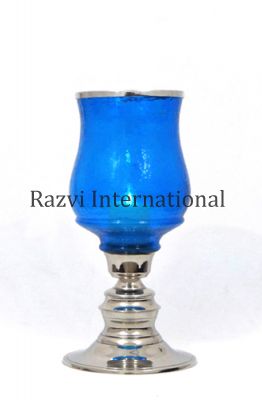 TURQUOISE GLASS T-LIGHT HOLDER-1
Item Code: A 621-1
Finish: Nickel & Turquoise Glass
Material: Aluminium & Glass
Keywords: ljuskrona och ljusstake