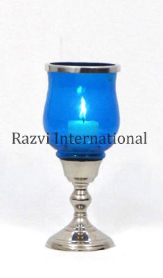SMALL CANDLE HOLDER-1
Item Code: A 631-1
Finish: Nickel & Turquoise Glass
Material: Aluminium & Glass
Keywords: svečturis un sveču turētājs