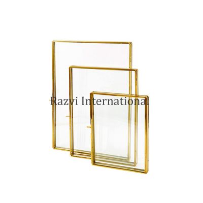 GLASS PHOTO FRAME
Item Code: A 1309
Finish: Polished & Clear Glass
Material: Steel & Glass
Keywords: GLASS PHOTO FRAME