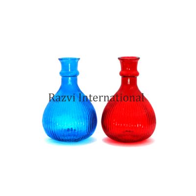 GLASS VASE
Item Code: A 663
Finish: Turquoise & Red
Material: Glass
Keywords: GLASS VASE
